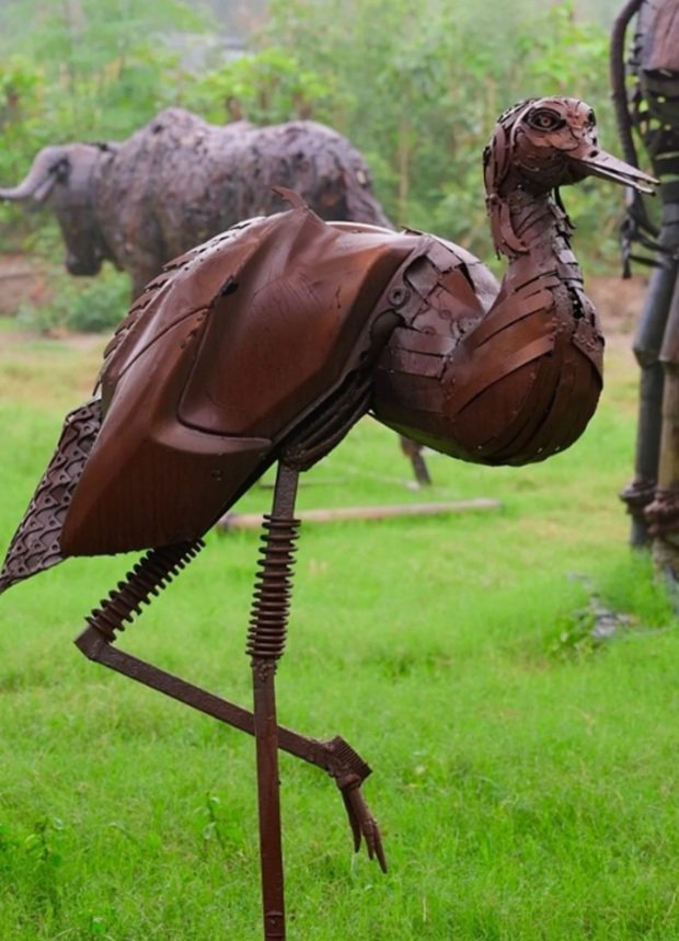“Wetlands habitat with bird sculptures at Noida’s new waste-to-wonder park”