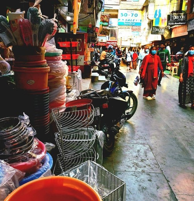 “Old shops and signboards inside Atta Market Noida Sector 18”
